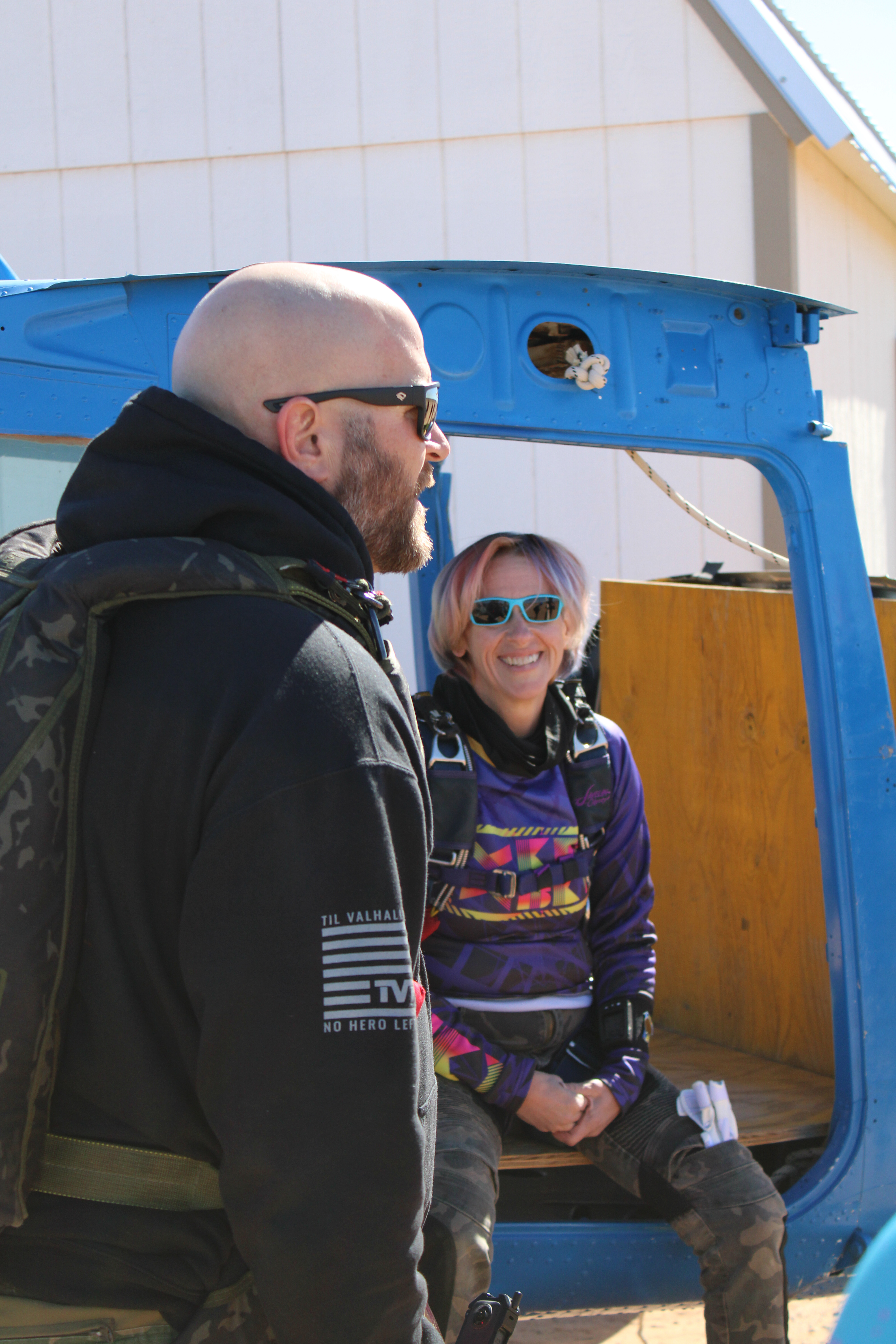 Tandem landing in grassy field